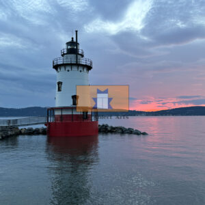 Orange and Blue sunset over Kingsland Point Lighthouse